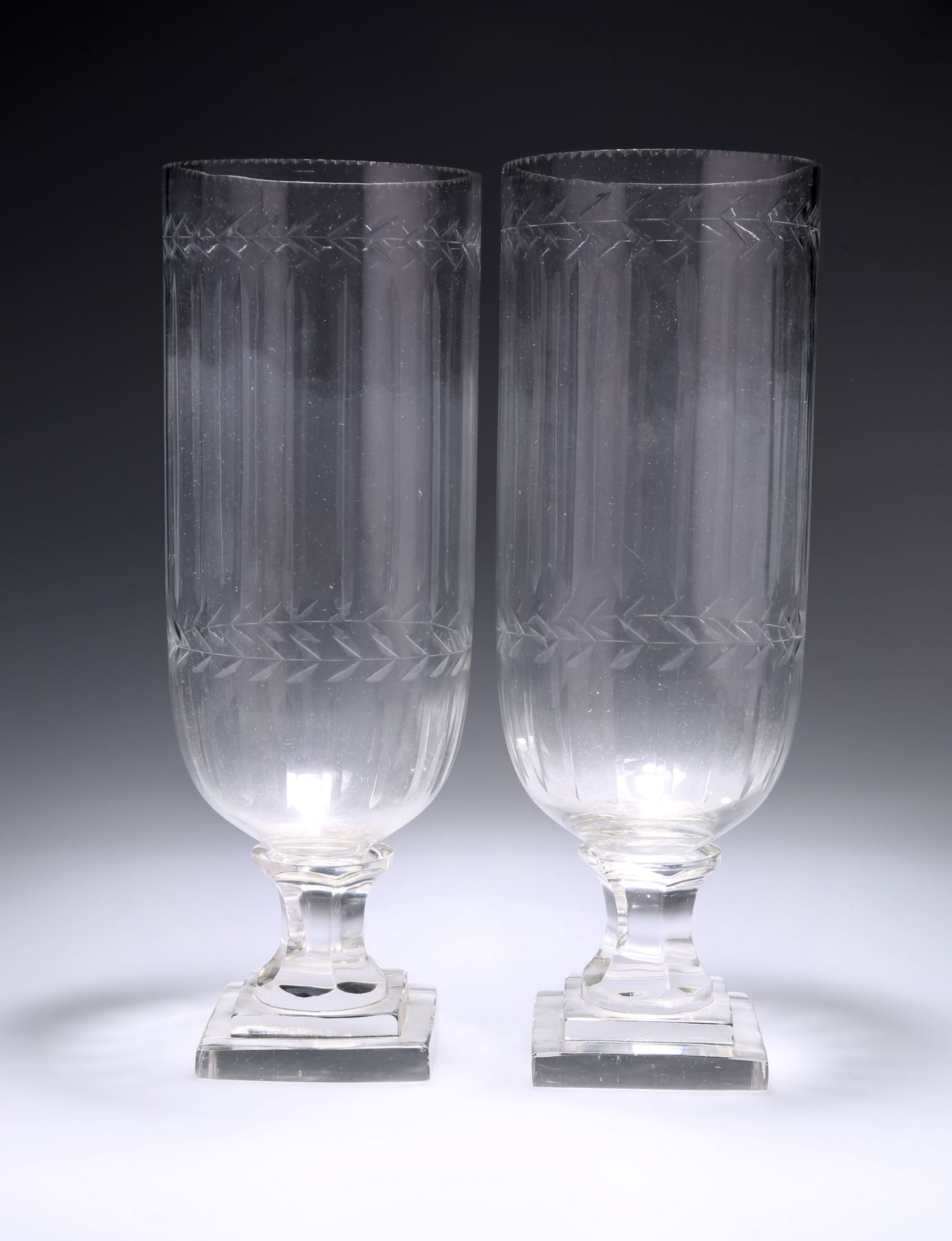 A PAIR OF CUT-GLASS VASES