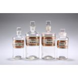 FOUR LATE VICTORIAN CLEAR GLASS LUG APOTHECARY BOTTLES