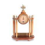 A CONTINENTAL WALNUT AND GILT-BRASS MOUNTED PORTICO CLOCK