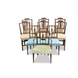 A MATCHED SET OF NINE GEORGE III MAHOGANY DINING CHAIRS