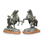A PAIR OF 19TH CENTURY BRONZE MODELS OF THE MARLY HORSES