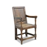 AN 18TH CENTURY OAK WAINSCOT CHAIR