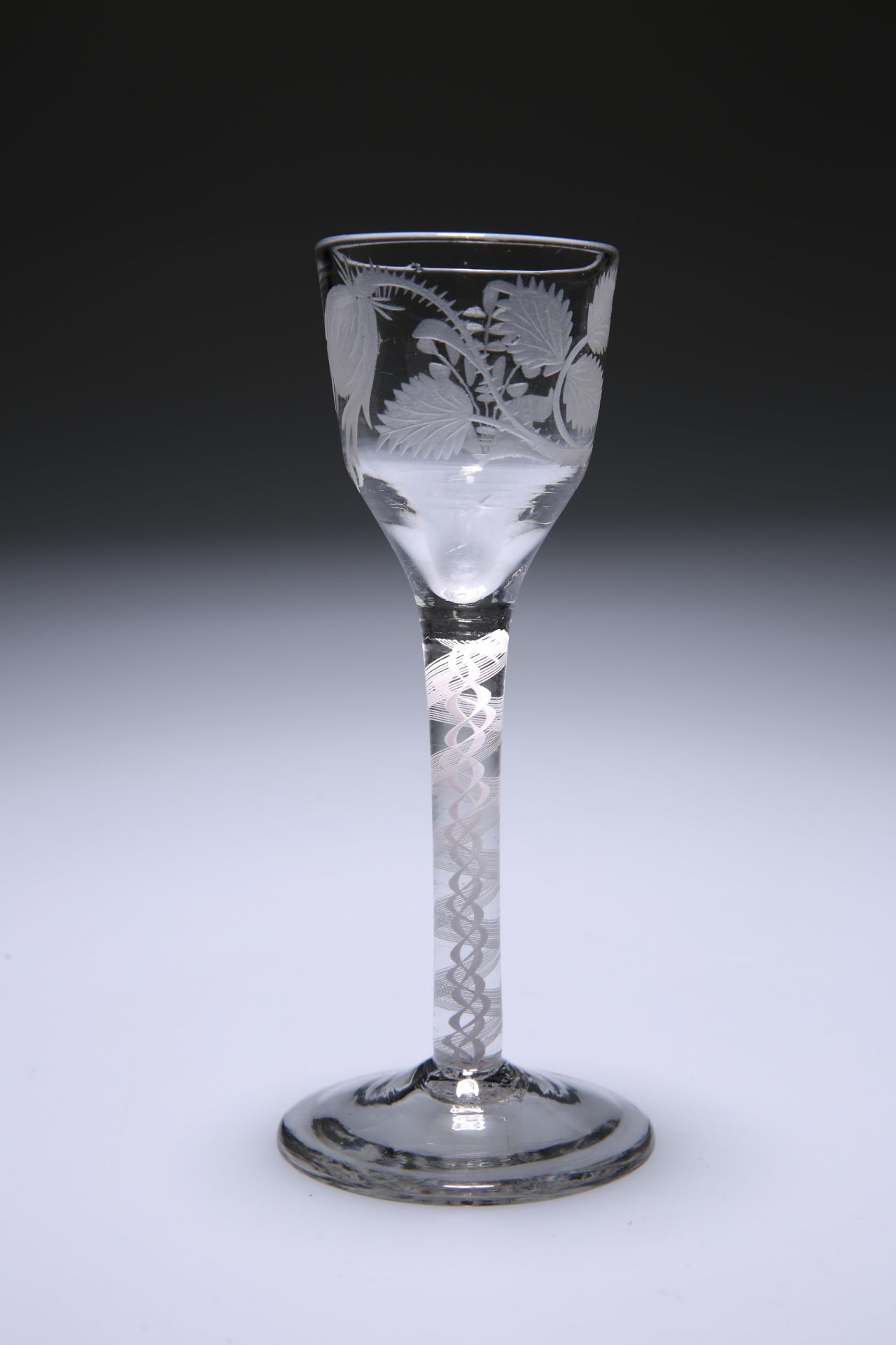 AN ENGRAVED OPAQUE TWIST WINE GLASS OF JACOBITE INTEREST