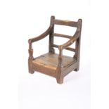 A SCOTTISH VERNACULAR CHILD'S CHAIR, with bar back and boarded seat