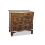 AN EARLY 18TH CENTURY WALNUT CHEST OF DRAWERS