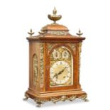 A LARGE BRASS-MOUNTED OAK BRACKET CLOCK