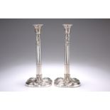 A PAIR OF GEORGE III SILVER CANDLESTICKS