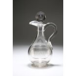 A GEORGE III GLASS CLARET JUG