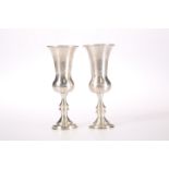 A NEAR PAIR OF GEORGE V SILVER KIDDUSH CUPS, by Josef Zweig