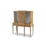 A COTSWOLD SCHOOL WALNUT VITRINE