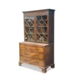 A GEORGE III MAHOGANY BOOKCASE ON CHEST