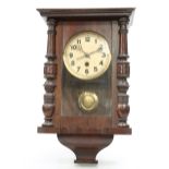 A LATE 19TH CENTURY WALNUT VIENNA PATTERN WALL CLOCK