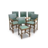 A SET OF SIX OAK AND UPHOLSTERED DINING CHAIRS, including two carvers