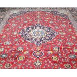 A KASHAN CARPET. 410cm by 305cm