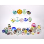 A COLLECTION OF THIRTY-SEVEN GLASS PAPERWEIGHTS