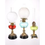 THREE VICTORIAN BRASS OIL LAMPS