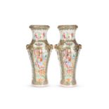 A PAIR OF CANTONESE FAMILLE ROSE VASES, 19TH CENTURY