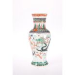 A CHINESE FAMILLE VERTE DRAGON VASE