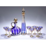 A 19TH CENTURY BOHEMIAN BLUE-OVERLAID AND GILDED CUT-GLASS LIQUEUR SET
