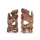 A PAIR OF CHINESE ZITAN FOO DOGS
