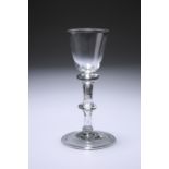 A BALUSTROID WINE GLASS