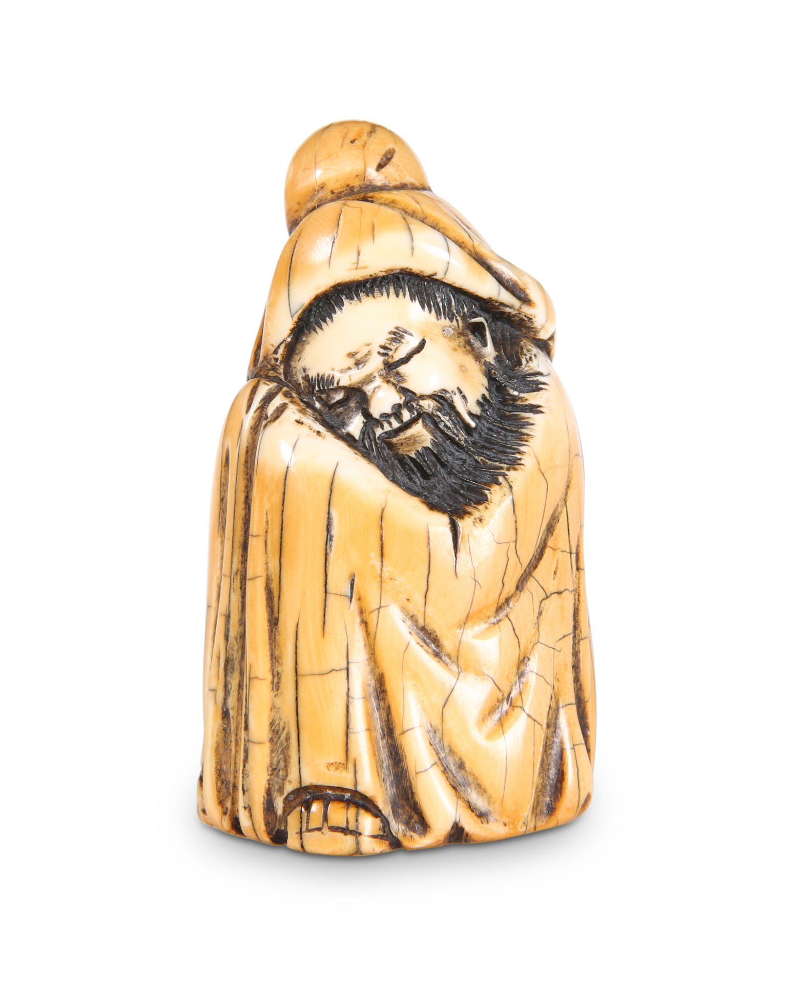 A CHINESE MAMMOTH IVORY CARVING OF A SLEEPING SCHOLAR