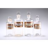 FOUR LATE VICTORIAN CLEAR GLASS LUG APOTHECARY BOTTLES