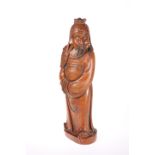 A LARGE JAPANESE CARVED WOODEN FIGURE, modelled in robes. 55cm high