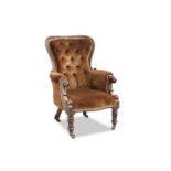 A VICTORIAN MAHOGANY SPOON-BACK ARMCHAIR