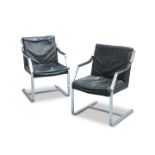 ATTRIBUTED TO RUDOLF GLATZEL FOR KNOLL, A PAIR OF LEATHER AND STEEL ARMCHAIRS