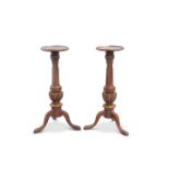 A PAIR OF VICTORIAN MAHOGANY TORCHERES