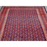 A QUM CARPET. 311cm by 220cm