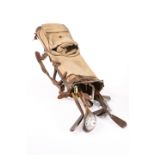 A GOLF BAG CONTAINING OLD WOODS, CLUBS, BALLS