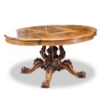 A VICTORIAN WALNUT BREAKFAST TABLE