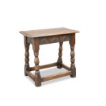 A 17TH CENTURY STYLE OAK JOINT STOOL
