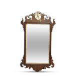 A GEORGE III MAHOGANY FRETWORK MIRROR