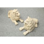 A LARGE PAIR OF POTTERY MODELS OF LIONS