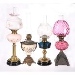FOUR VICTORIAN OIL LAMPS