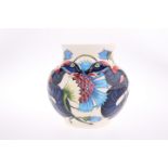 A MOORCROFT POTTERY TRIAL VASE