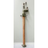 AN EARLY 20TH CENTURY BRONZE FIRE HYDRANT STAND PIPE. 128.5cm