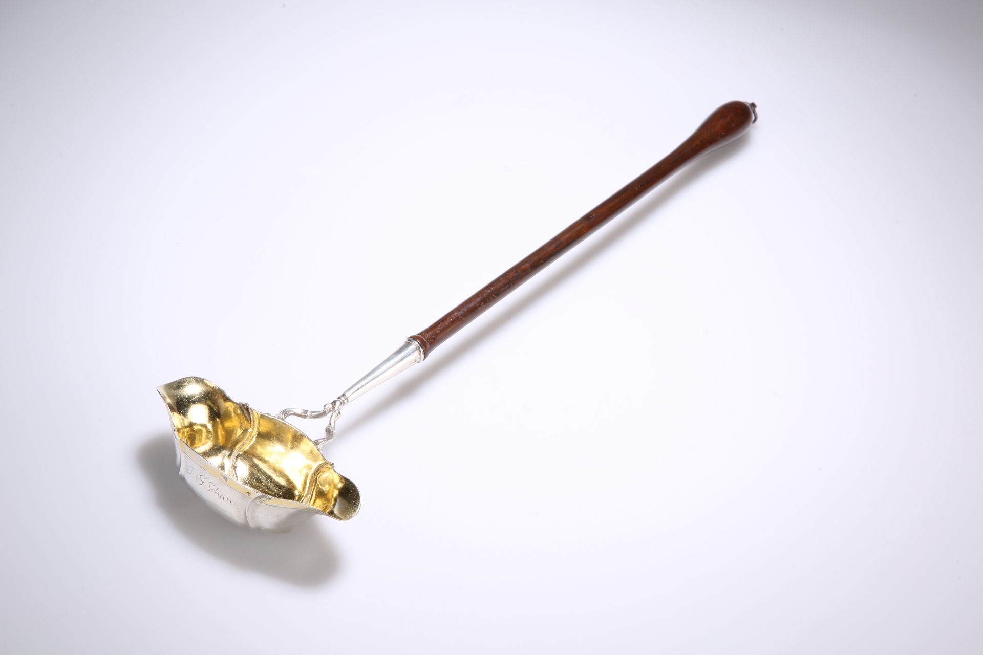 A CONTINENTAL SILVER LADLE, 18TH CENTURY