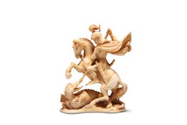 A 19TH CENTURY IVORY CARVING OF SAINT GEORGE AND THE DRAGON