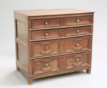 A 17TH CENTURY OAK MOULDED-FRONT CHEST OF DRAWERS