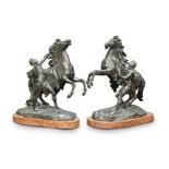 A PAIR OF 19TH CENTURY BRONZE MODELS OF THE MARLY HORSES