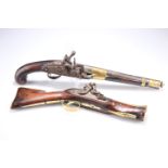 TWO ANTIQUE BRASS-MOUNTED FLINTLOCK PISTOLS