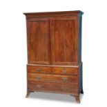 A GEORGE III MAHOGANY LINEN PRESS