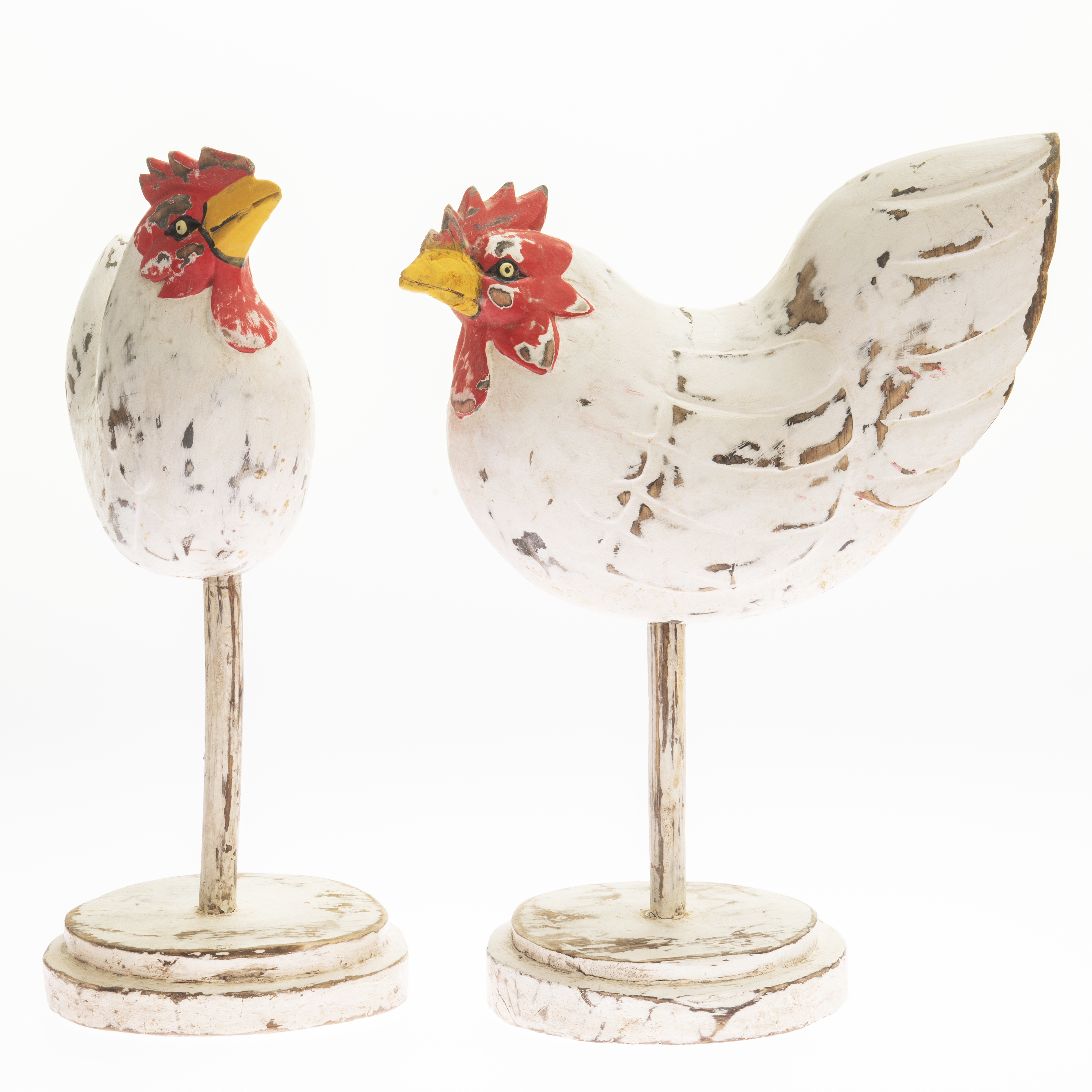 A PAIR OF CARVED AND PAINTED WOODEN BUTCHER'S ADVERTISING HENS