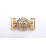 AN OFFICER'S SILVERED AND GILDED WAIST BELT CLASP