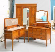 AN EDWARDIAN INLAID MAHOGANY FOUR-PIECE BEDROOM SUITE