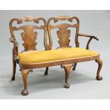 A WALNUT CHAIR BACK SETTEE, IN GEORGE II STYLE, 19TH CENTURY